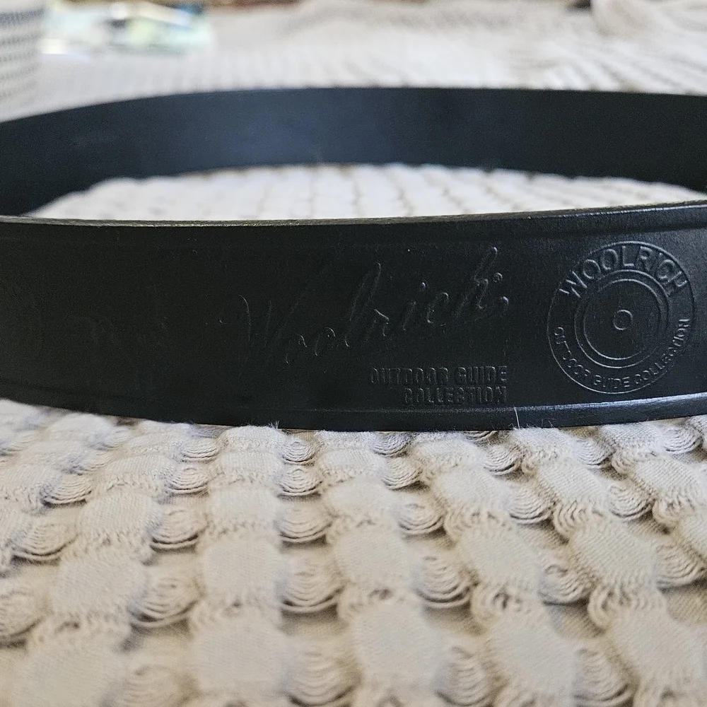 WOOLRICH Outdoor Guide Collection Leather Belt In Black with Gold Buckle.